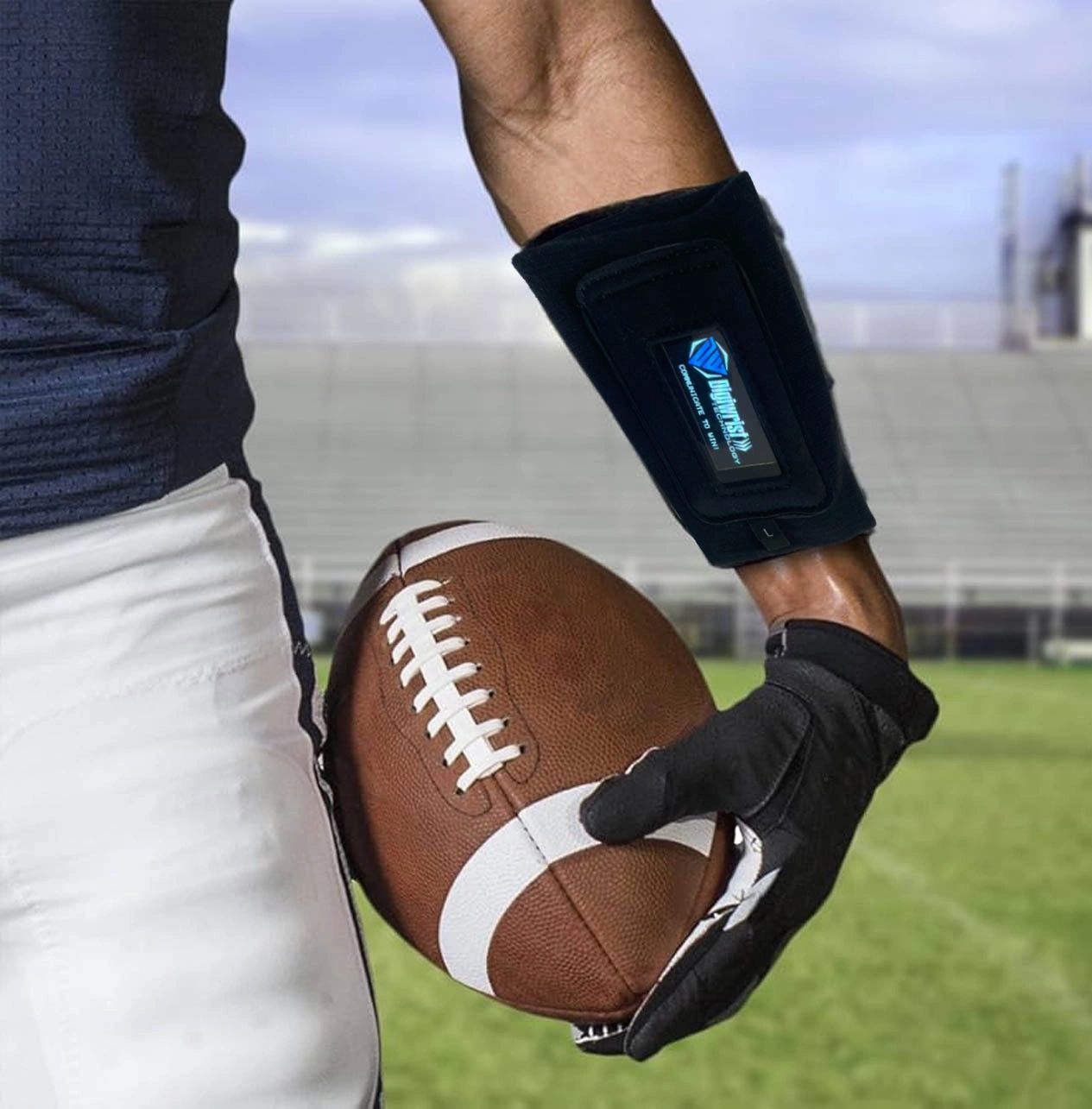 DigiWrist receiver on a player's forearm with the football