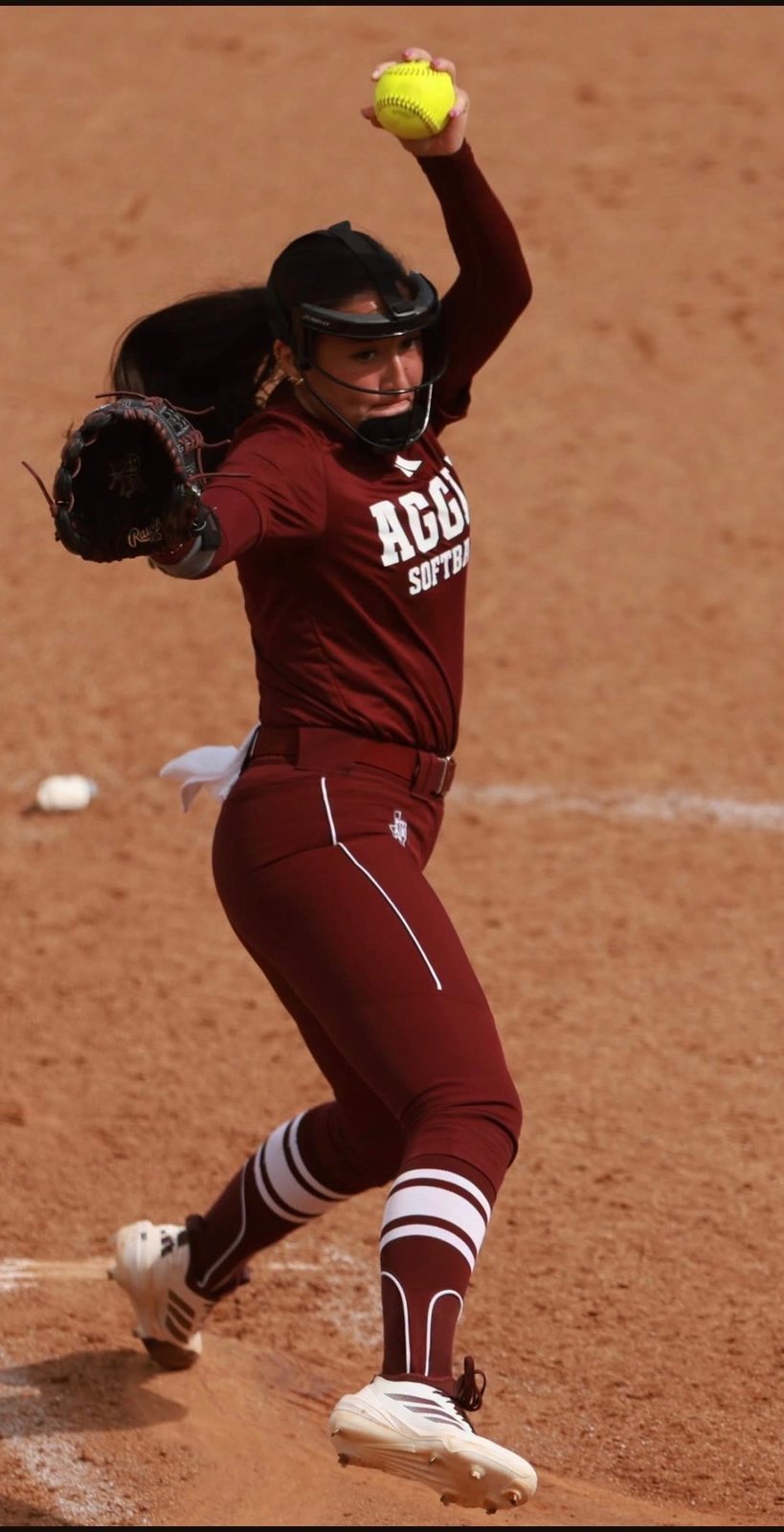 Texas A&M softball pitcher wearing a DigiWrist receiver