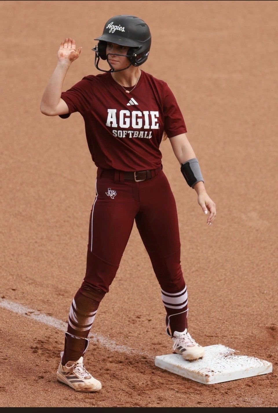 Texas A&M softball runner with a DigiWrist wrist receiver