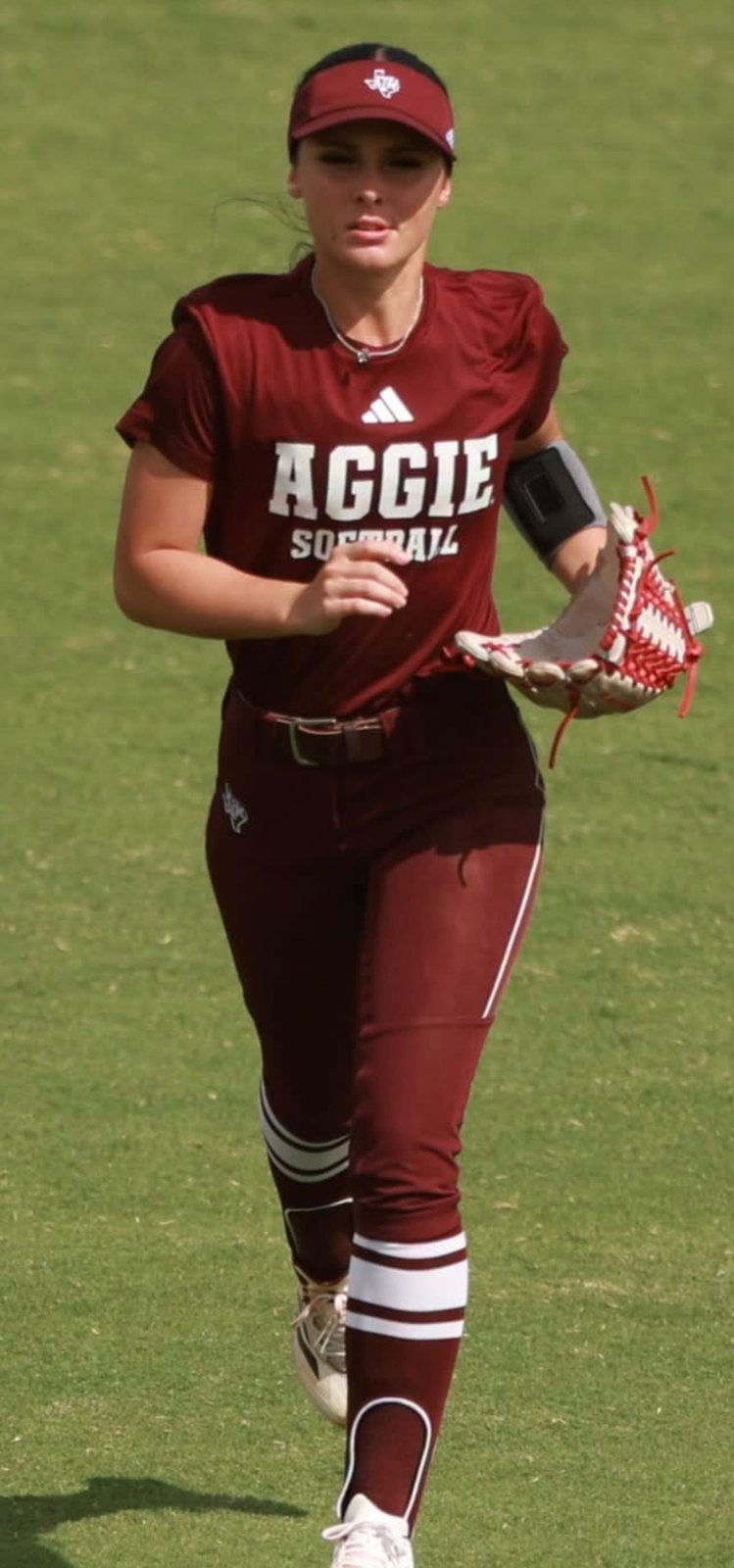 Texas A&M softball outfielder wearing a DigiWrist receiver